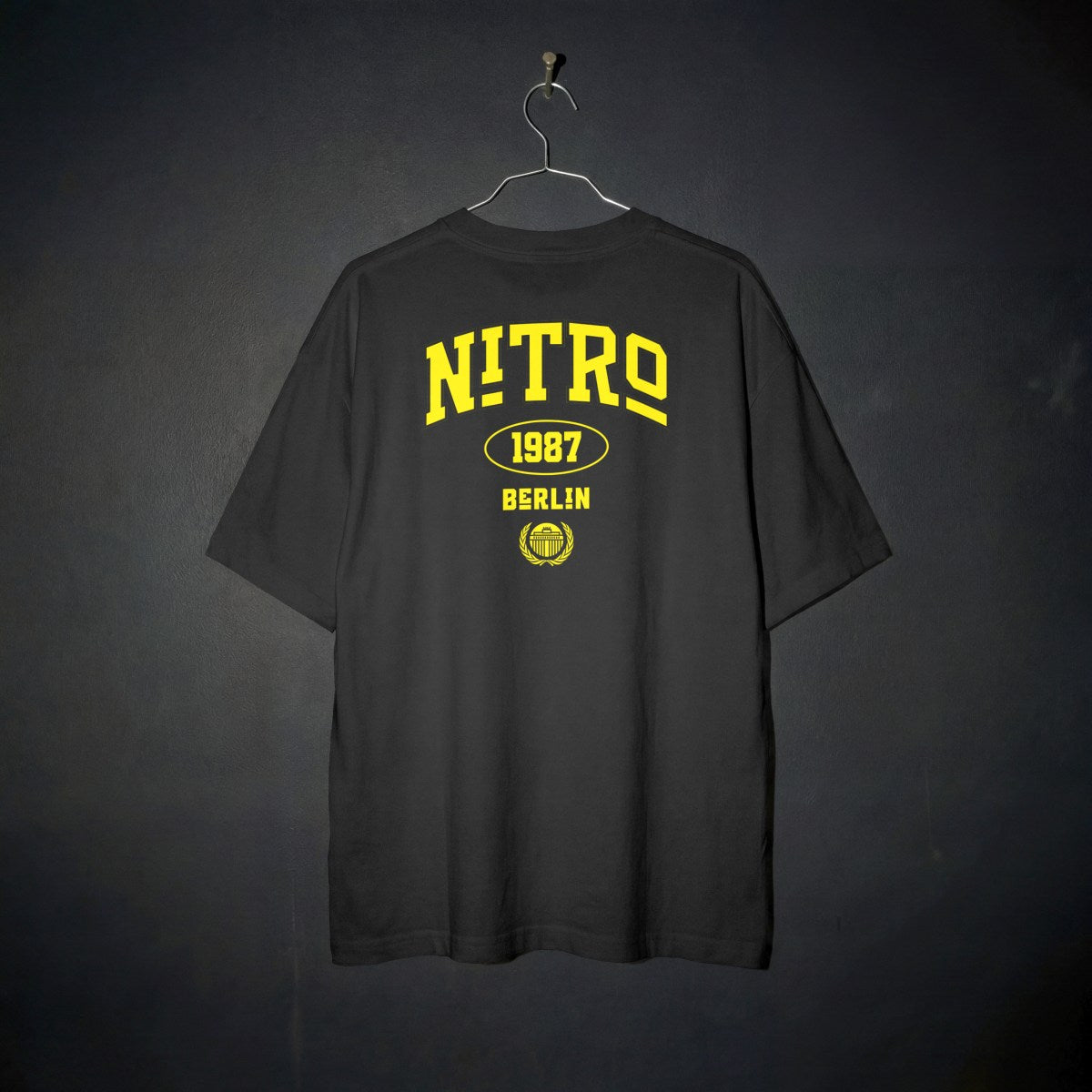 Back view of Lena Nitro Berlin yellow typography shirt
